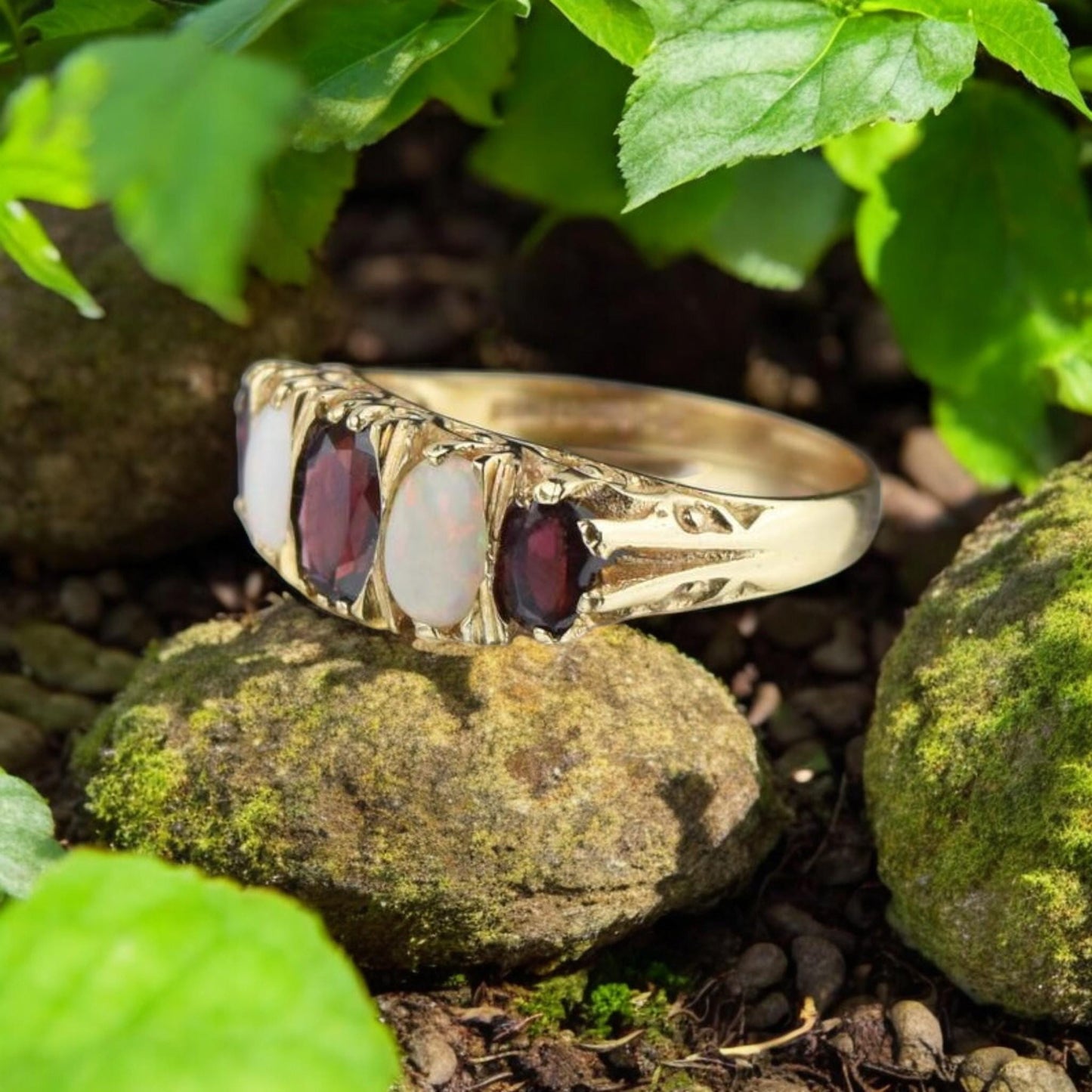 Victorian-era inspired oval garnet and opal ring in 18K yellow gold-plated sterling silver.