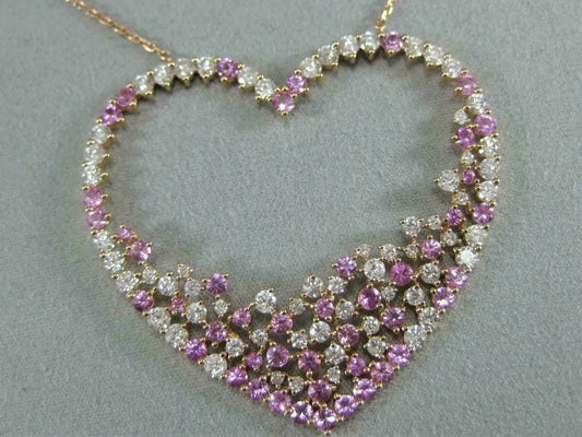 Heart-shaped fuchsia pink and white CZ pendant in 925 sterling silver, perfect Valentine’s gift.