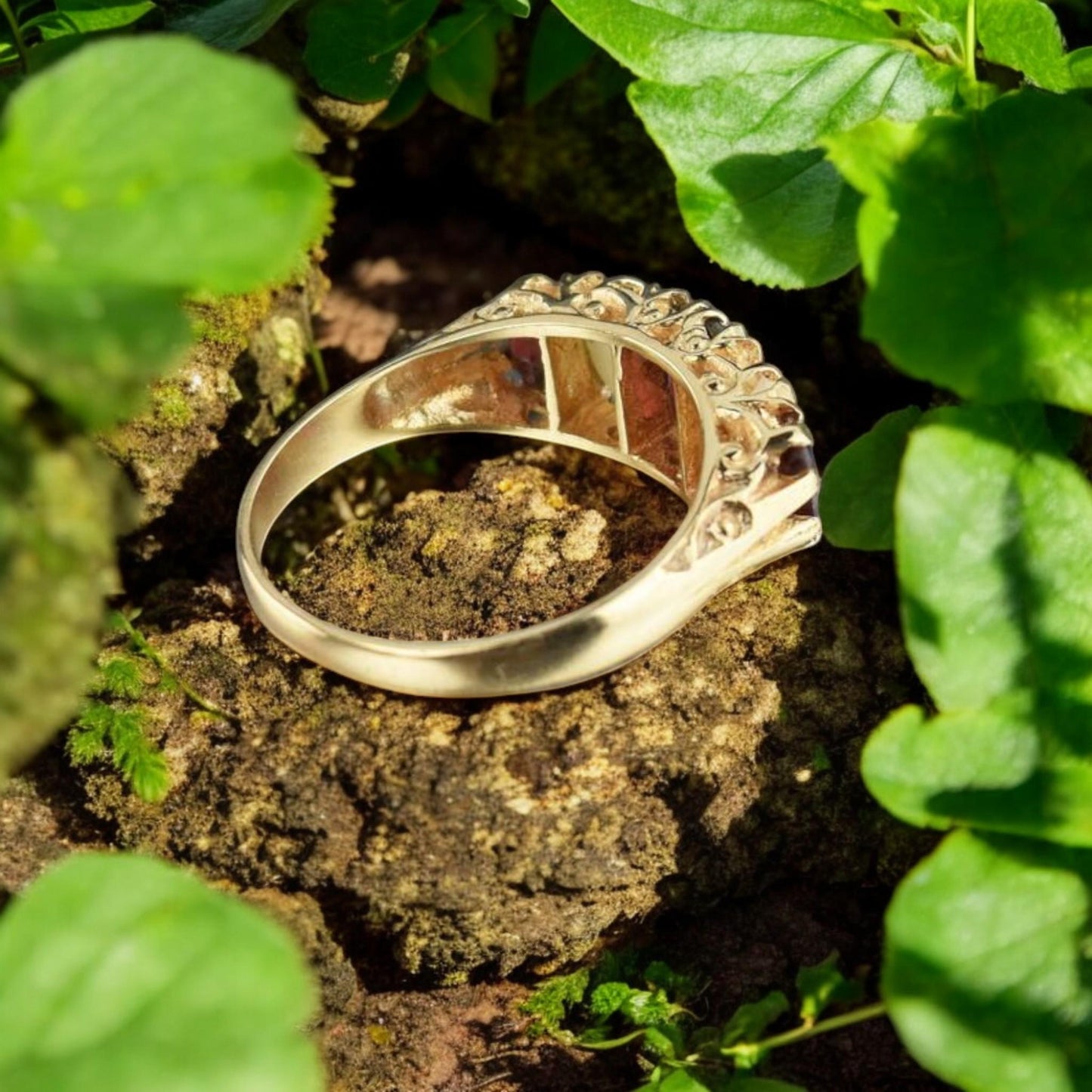 Handcrafted antique design ring with a natural garnet and opal gemstone duo, set in gold-plated silver.