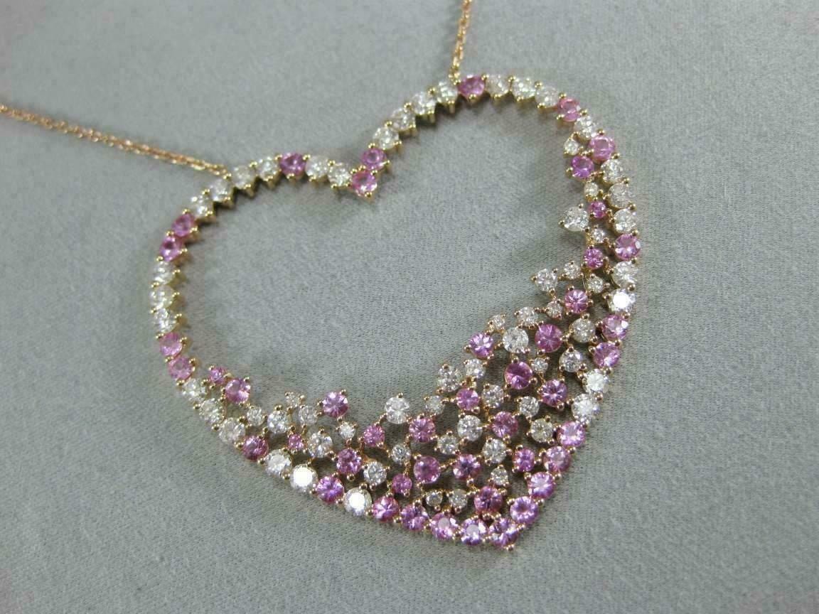 925 sterling silver heart pendant with radiant pink and white cubic zirconia gemstones.