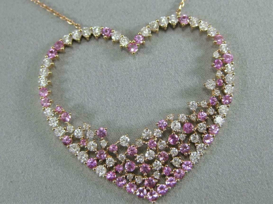 Heart-shaped fuchsia pink and white CZ pendant in 925 sterling silver, perfect Valentine’s gift.