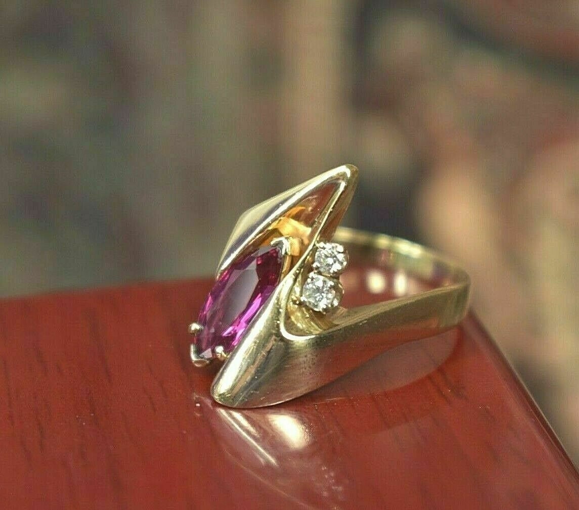 Close-up of pink gemstone ring, gold plated 925 sterling silver